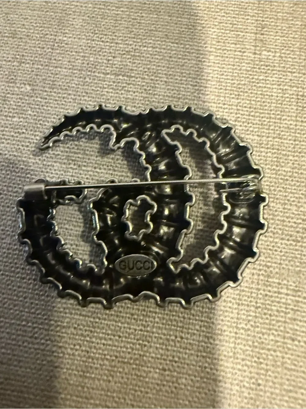 New with box Gucci gun metal color gg brooch